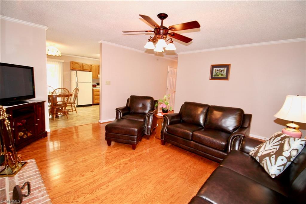 Access from living to kitchen and hallway to bedrooms.