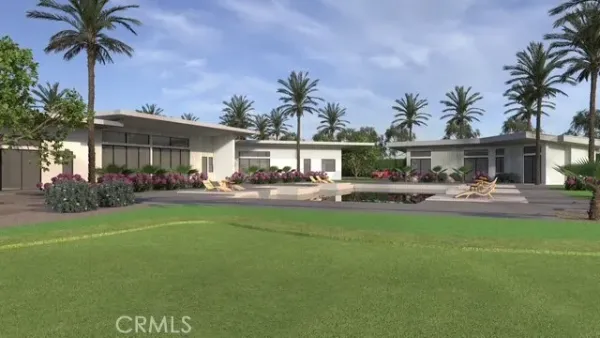 a front view of a house with garden and patio