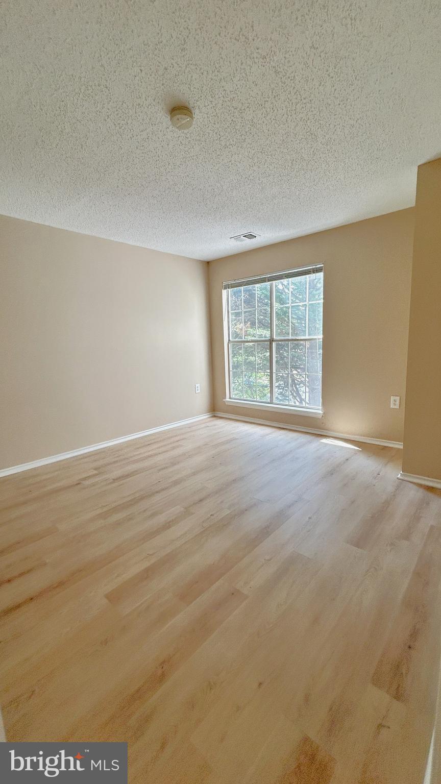 21019 Timber Ridge Terrace, Unit 203 Ashburn, VA 20147 - Photo 12 of 17 Bedroom 2