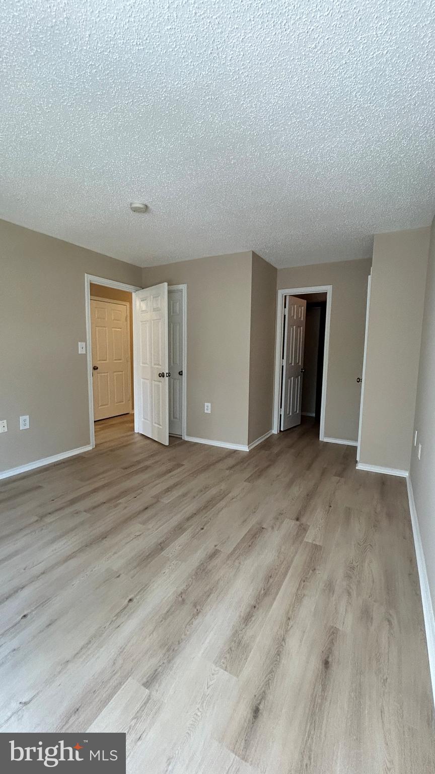 21019 Timber Ridge Terrace, Unit 203 Ashburn, VA 20147 - Photo 14 of 17 Bedroom 2