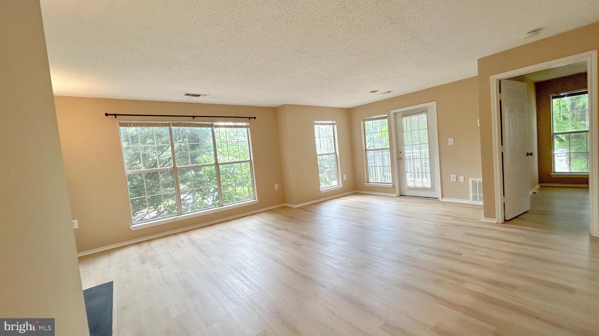 21019 Timber Ridge Terrace, Unit 203 Ashburn, VA 20147 - Photo 5 of 17 Dining/Living