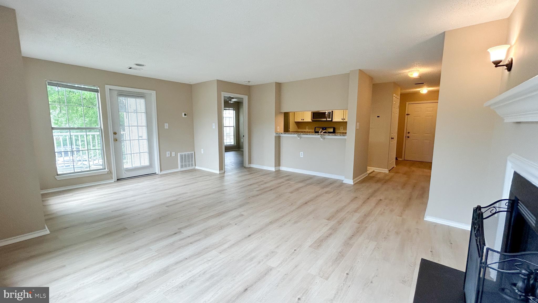 21019 Timber Ridge Terrace, Unit 203 Ashburn, VA 20147 - Photo 6 of 17 Dining/Living