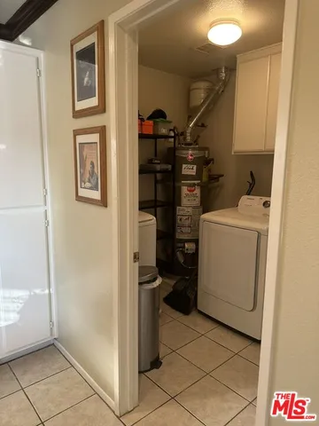 a view of a storage & utility room with washer and dryer