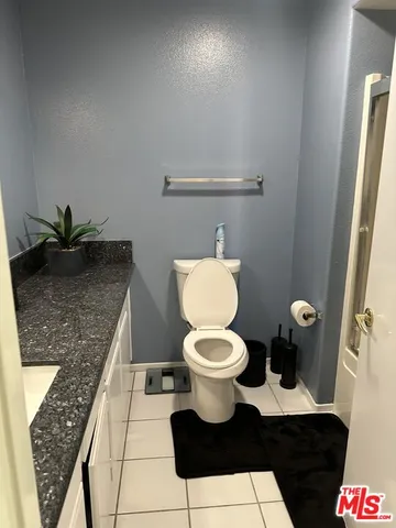 a bathroom with a toilet and a sink