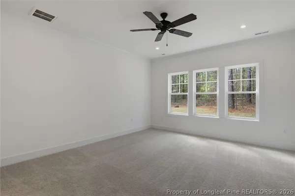 a bathroom with a double vanity sink a mirror and a shower