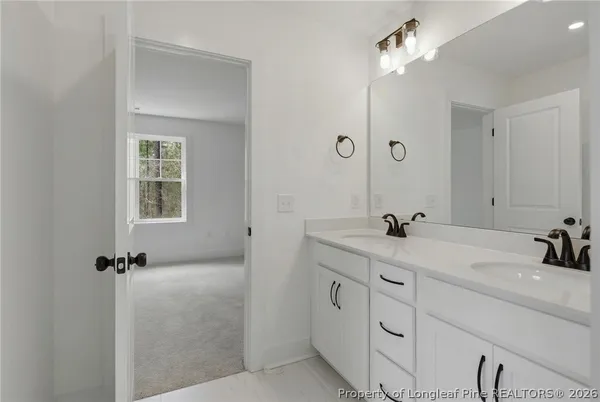 a bathroom with a tub and shower