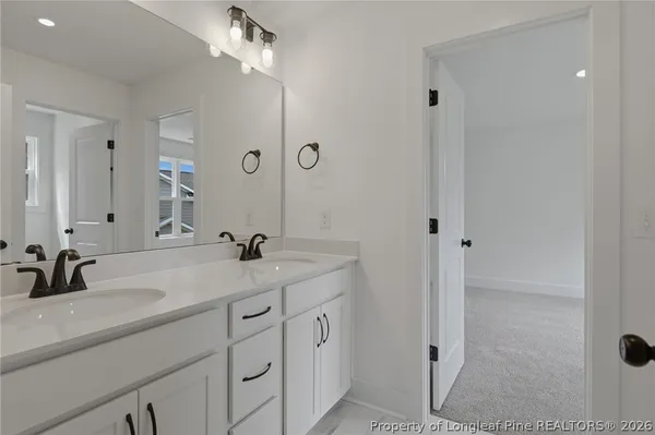 a view of swimming pool with a table and chairs