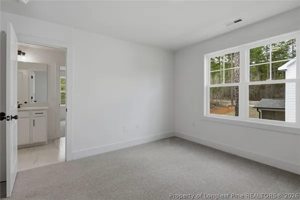 a view of a park with welcome board