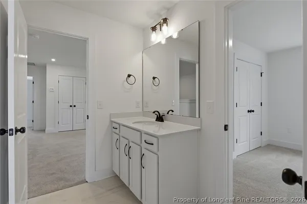 a backyard of a house with garden barbeque oven and outdoor seating