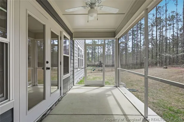 a front view of a house with yard and green space