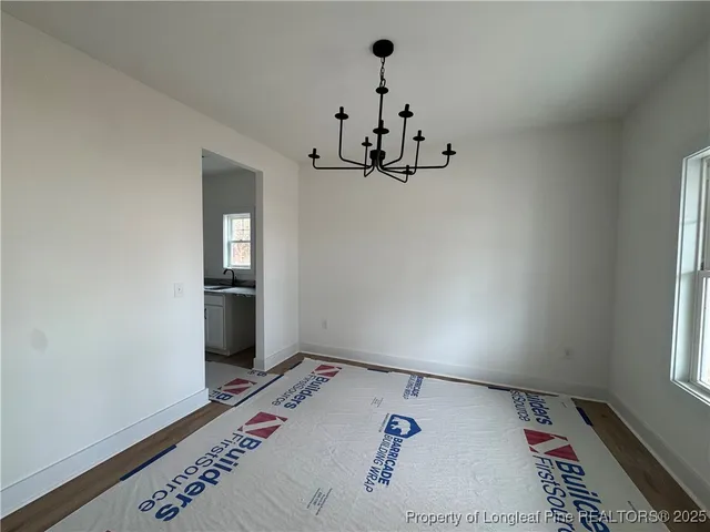 a view of a hallway with a workspace