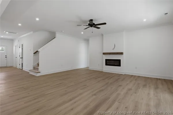 a bathroom with double sink and a mirror