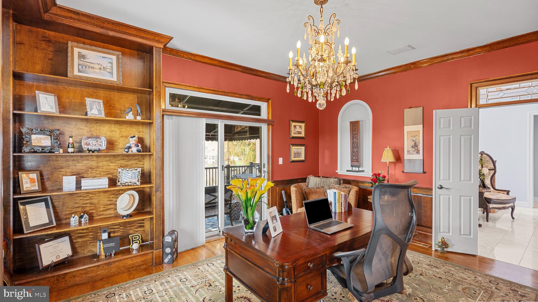 927 Western Road Hunt Valley, MD 21030 - Photo 15 of 80 a view of a dining room with furniture and a chandelier