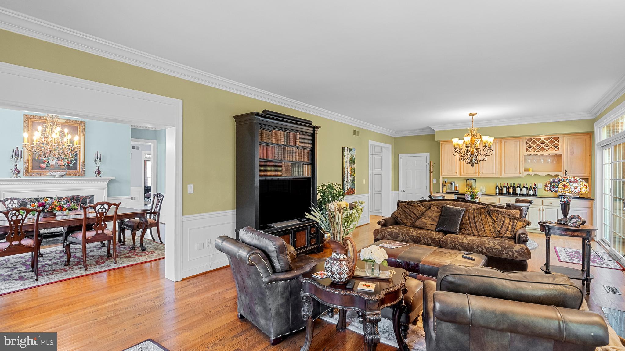 927 Western Road Hunt Valley, MD 21030 - Photo 32 of 80 a living room with furniture and a flat screen tv