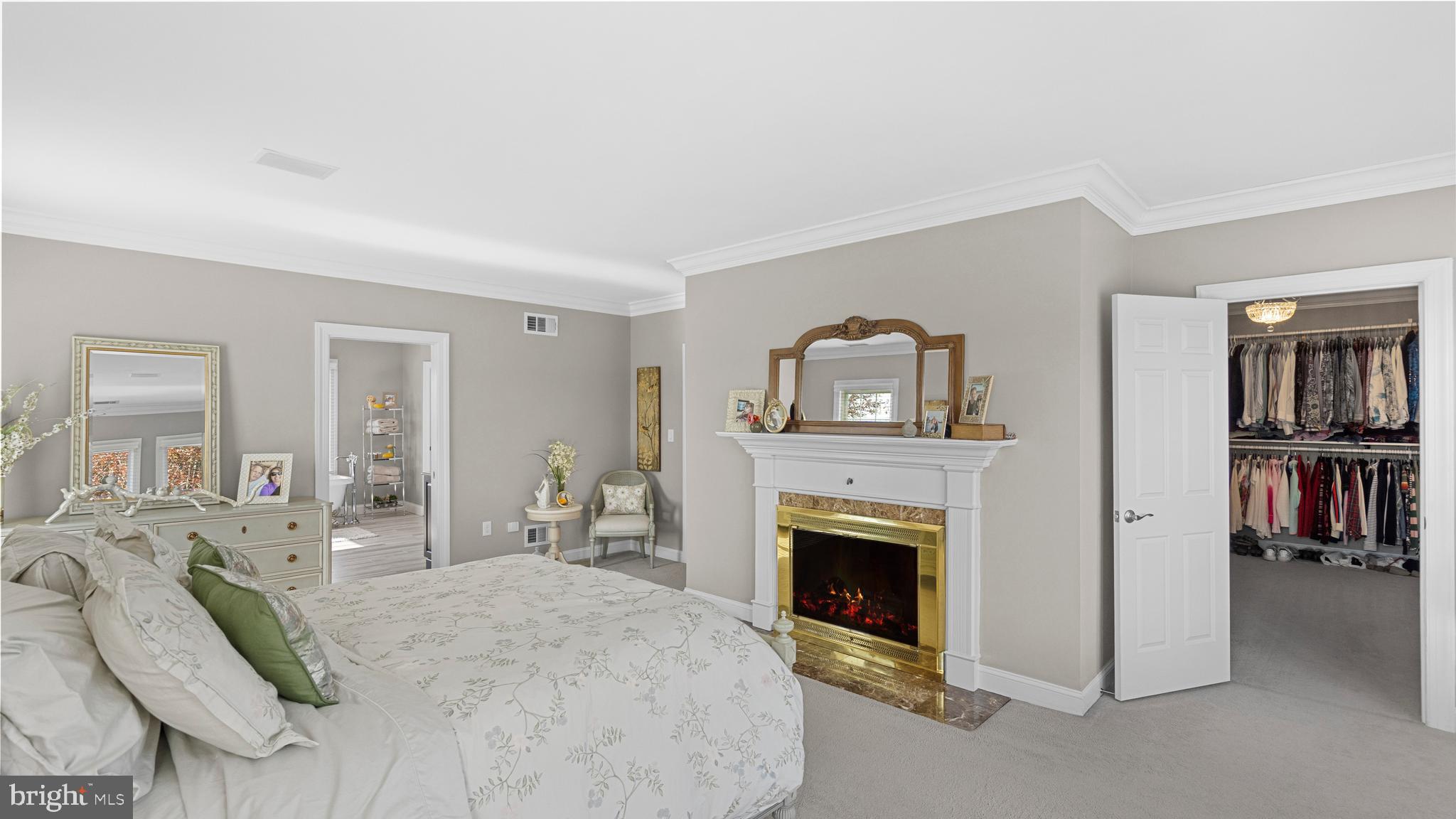 927 Western Road Hunt Valley, MD 21030 - Photo 39 of 80 a living room with furniture a fireplace and a flat screen tv