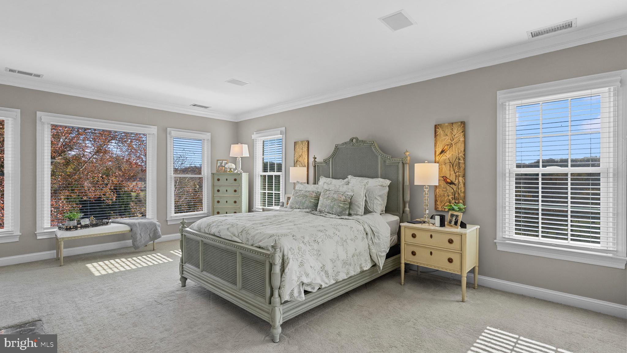 927 Western Road Hunt Valley, MD 21030 - Photo 41 of 80 a bedroom with a bed and a couch next to a window