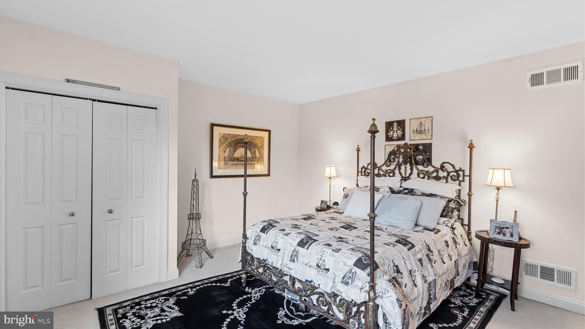 927 Western Road Hunt Valley, MD 21030 - Photo 48 of 80 a bedroom with a bed and a table in it