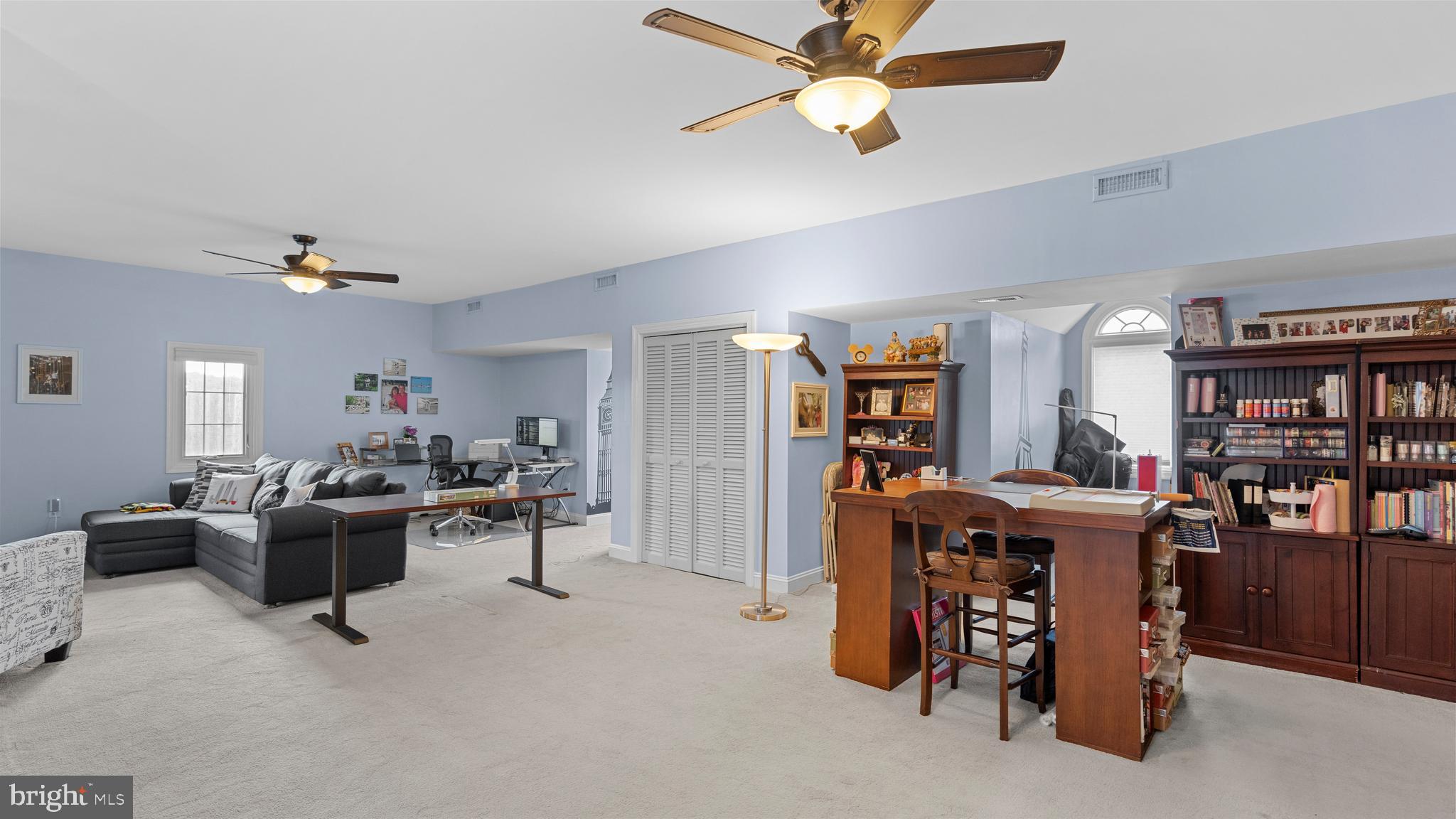 927 Western Road Hunt Valley, MD 21030 - Photo 54 of 80 a view of a livingroom with furniture and a bookshelf