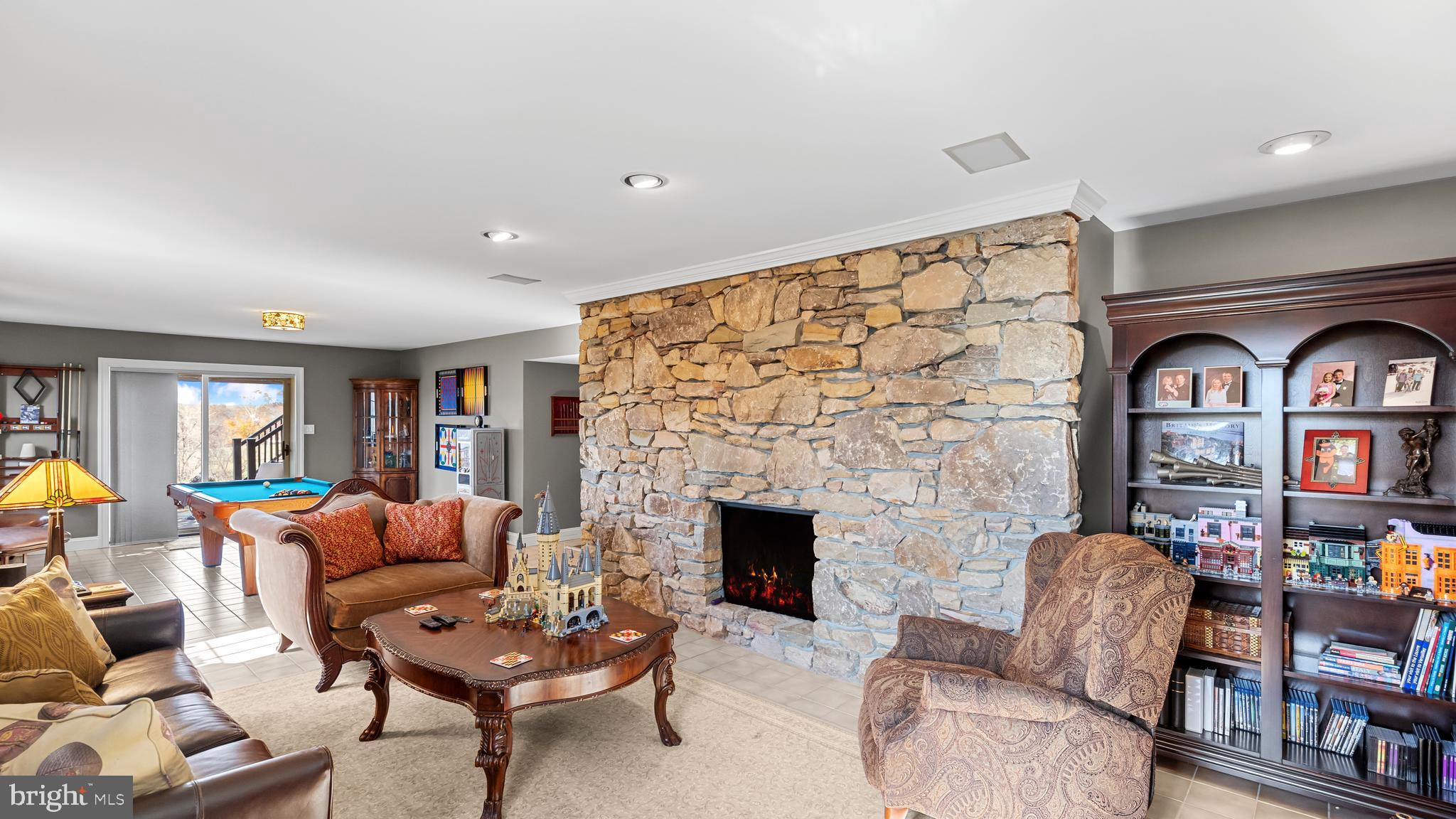 927 Western Road Hunt Valley, MD 21030 - Photo 61 of 80 a living room with furniture and a fireplace