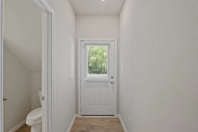 a view of bathroom with a toilet