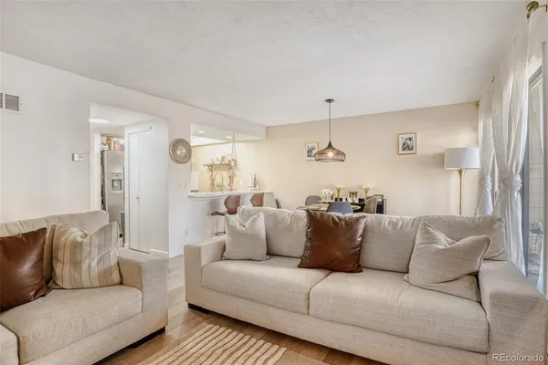 a living room with furniture and a couch