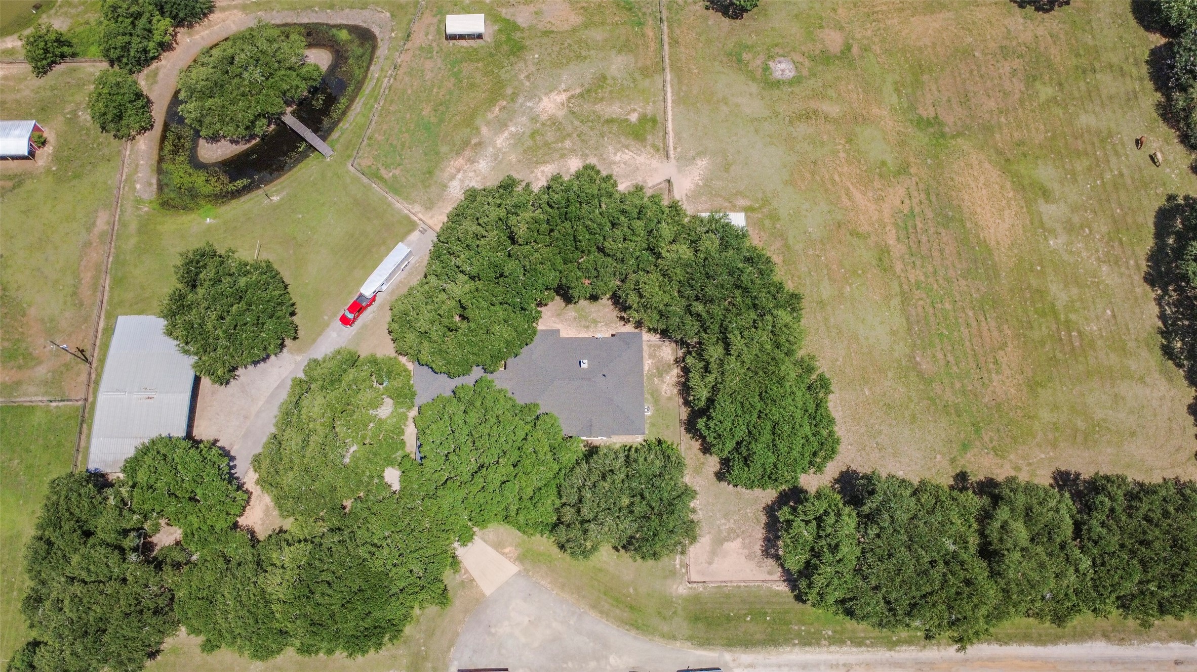 29103 Quail Nest Road Hockley, TX 77447 - Photo 36 of 49 Aerial of homesite, shop and pond