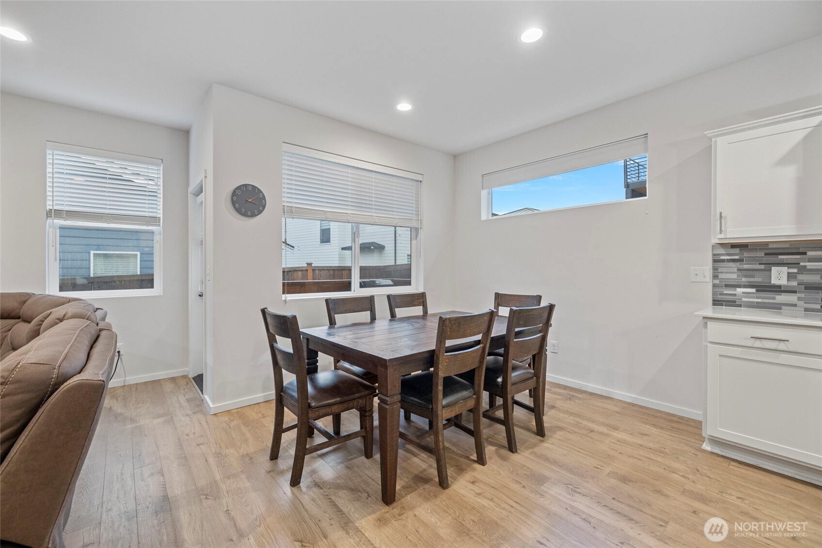 2113 Lancaster Way Ferndale, WA 98248 - Photo 14 of 32 a view of a dining room with furniture and wooden floor