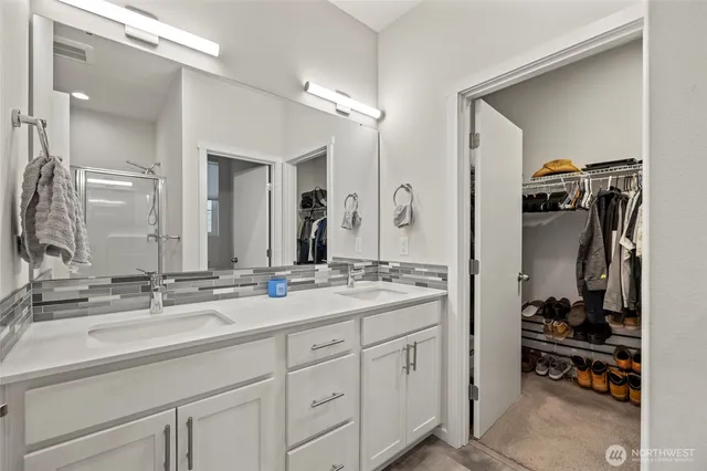 a bathroom with a sink double vanity