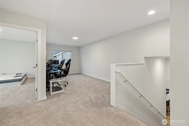 a view of work space with furniture and stairs
