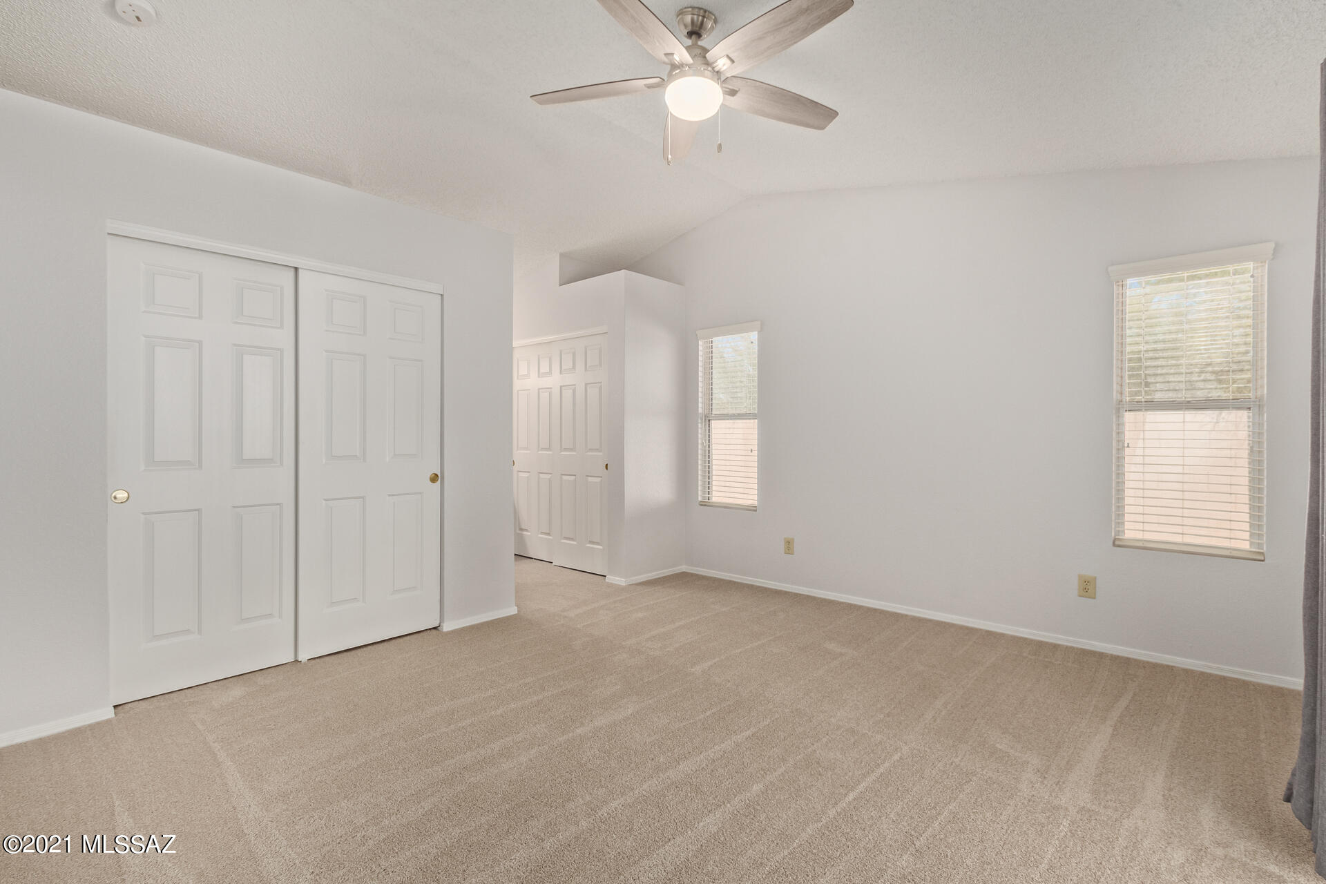 3034 West Sky Ranch Trail Tucson, AZ 85742 - Photo 13 of 27 a view of an empty room with a window