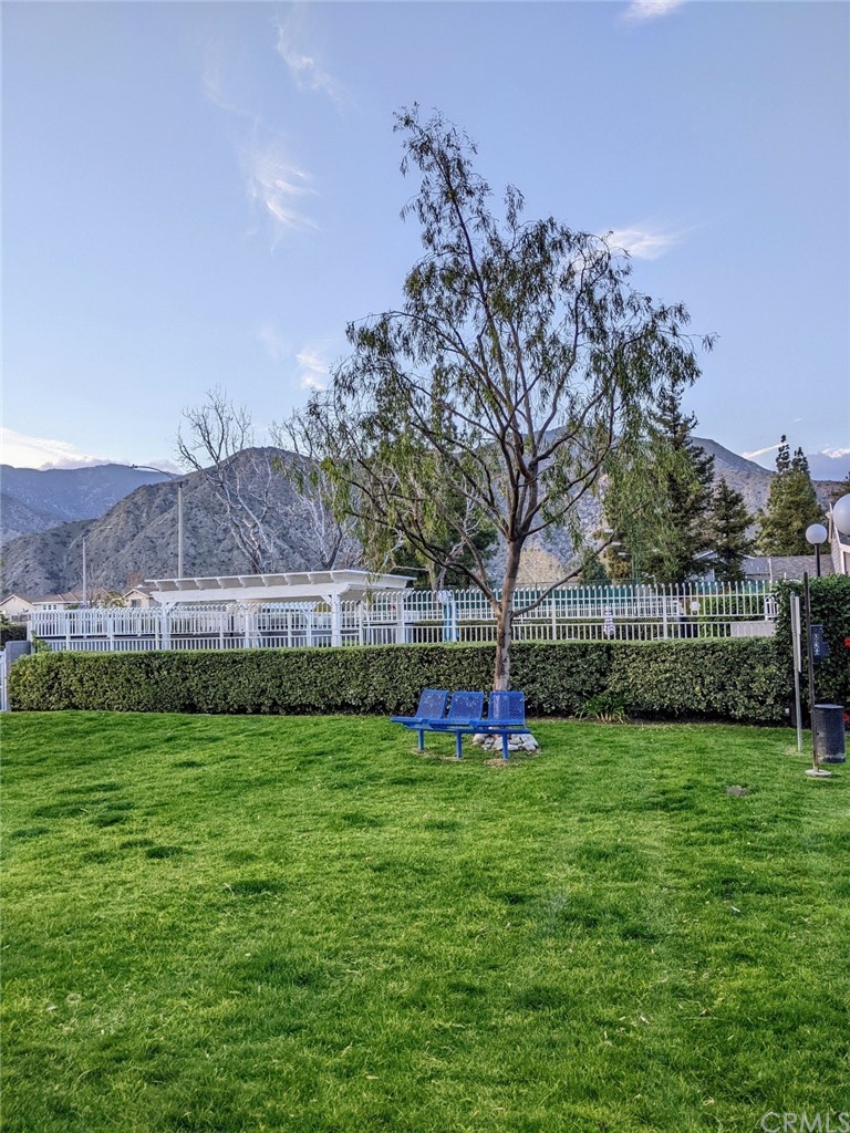 1641 Dimas Court Azusa, CA 91702 - Photo 7 of 14 a view of a field of grass and trees