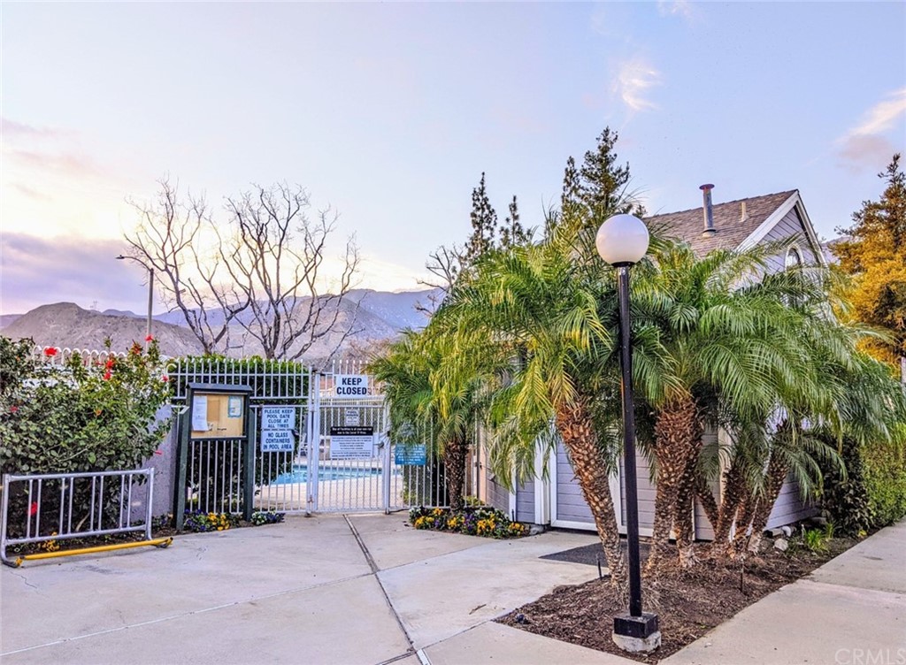 1641 Dimas Court Azusa, CA 91702 - Photo 8 of 14 a front view of a house with a tree