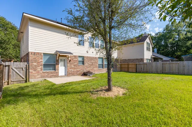 a view of a backyard with a garden