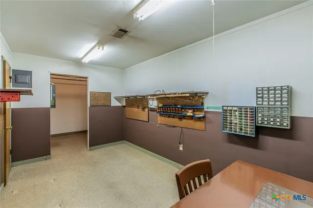 a view of kitchen and windows