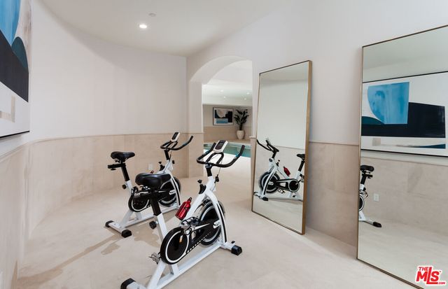 a view of a street with a building in the background