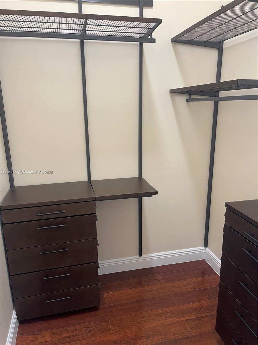 7280 Southwest 90th Street, Unit 708 Miami, FL 33156 - Photo 8 of 18 a view of front door with wooden floor