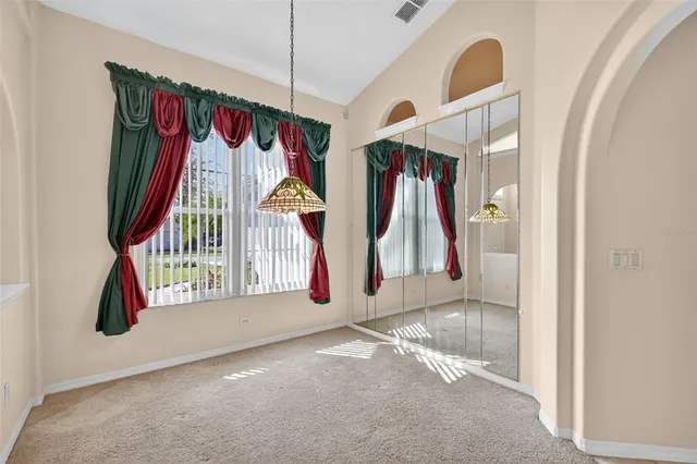 a view of an entryway with a chandelier