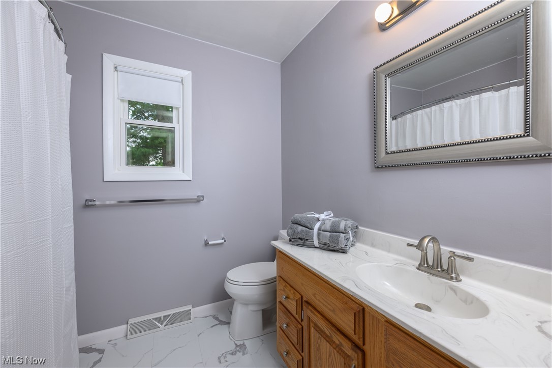 4202 Mapleton Street Southeast Canton, OH 44707 - Photo 17 of 31 Updated bath w/ plenty of counter space