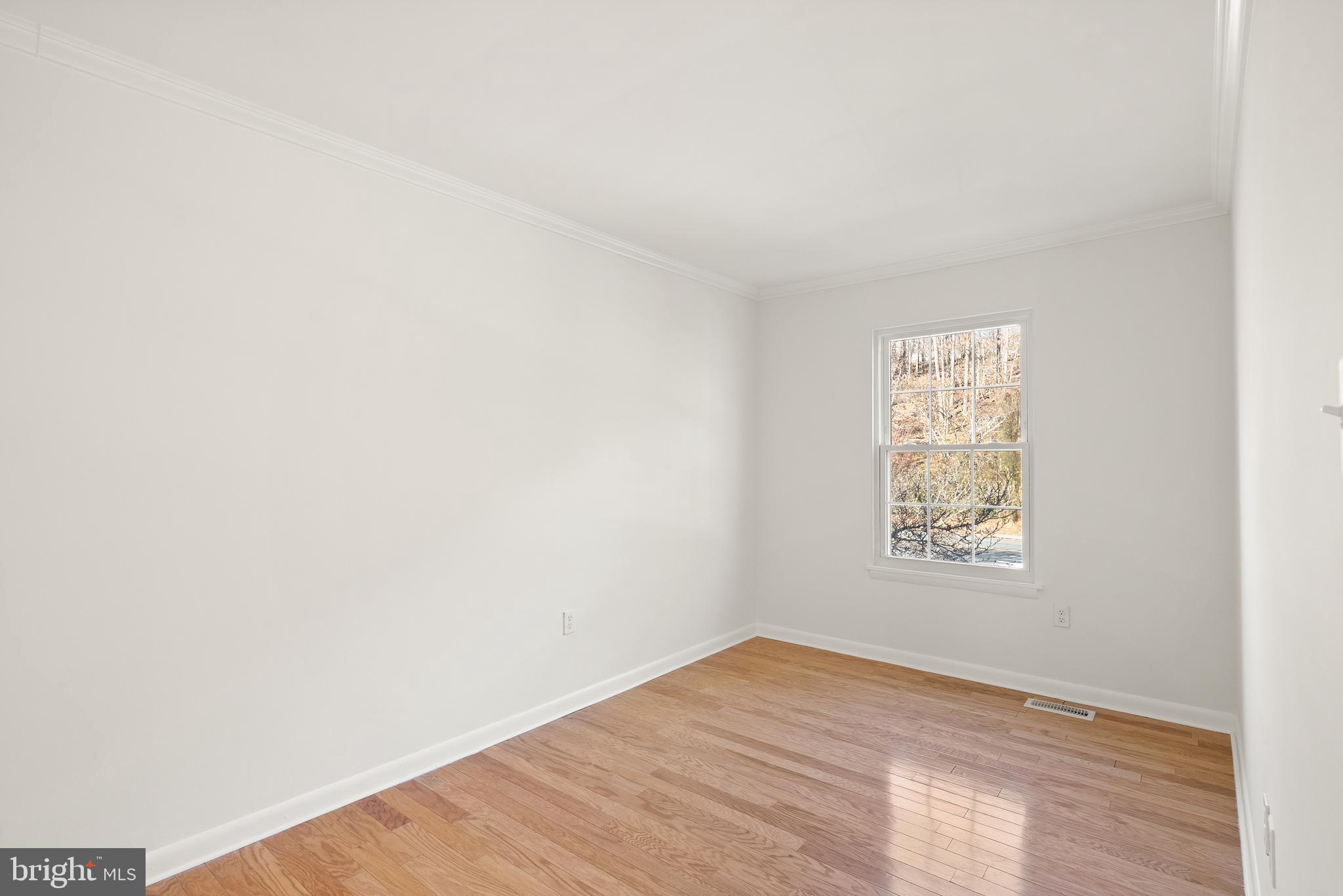 15278 Cloverdale Road Woodbridge, VA 22193 - Photo 20 of 35 a view of an empty room with a window