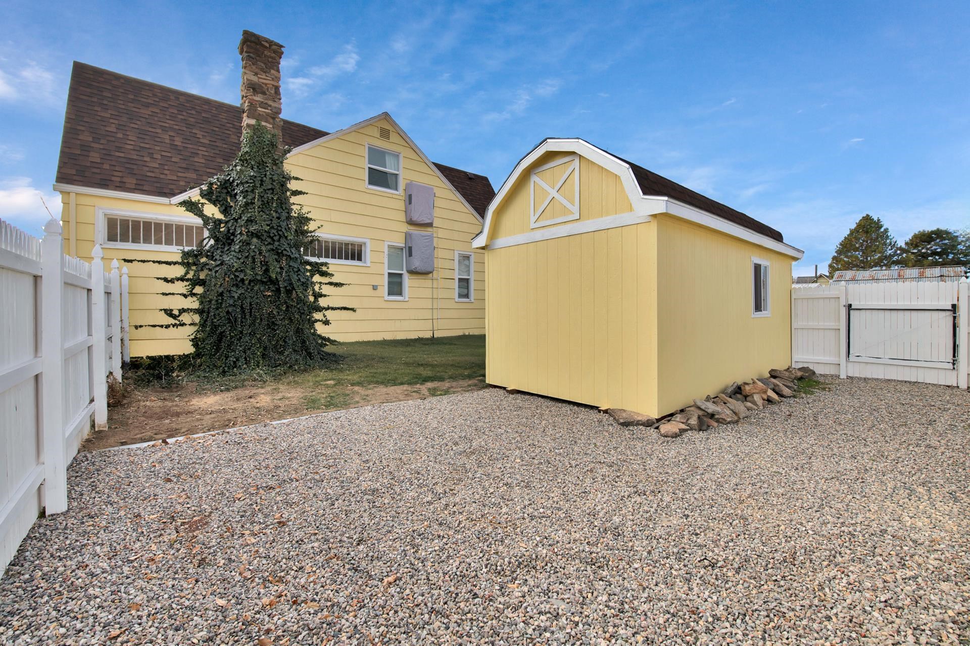 508 Main Street Palisade, CO 81526 - Photo 11 of 40 a view of a house with a yard