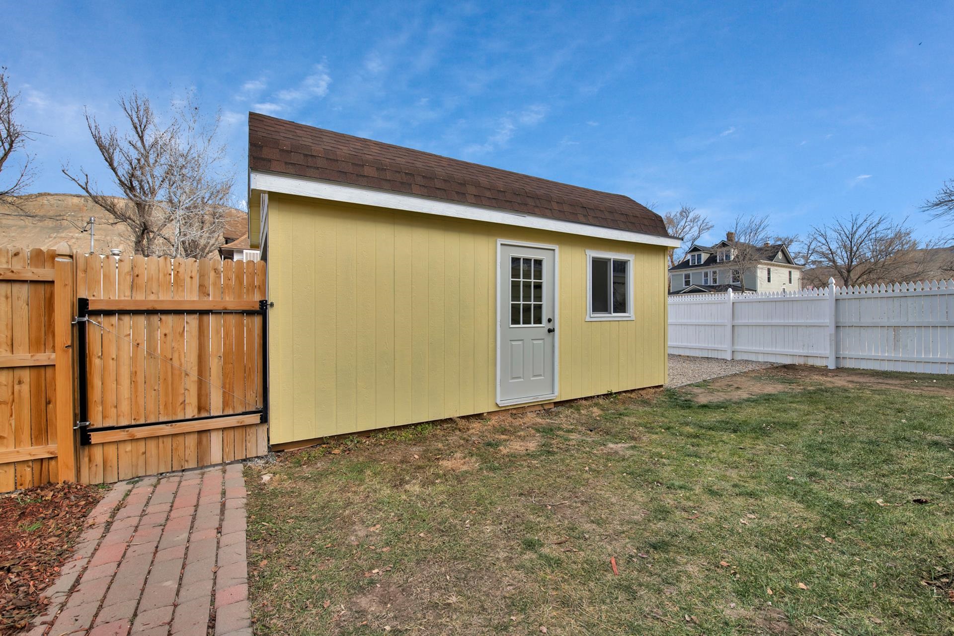 508 Main Street Palisade, CO 81526 - Photo 12 of 40 a view of backyard with wooden fence