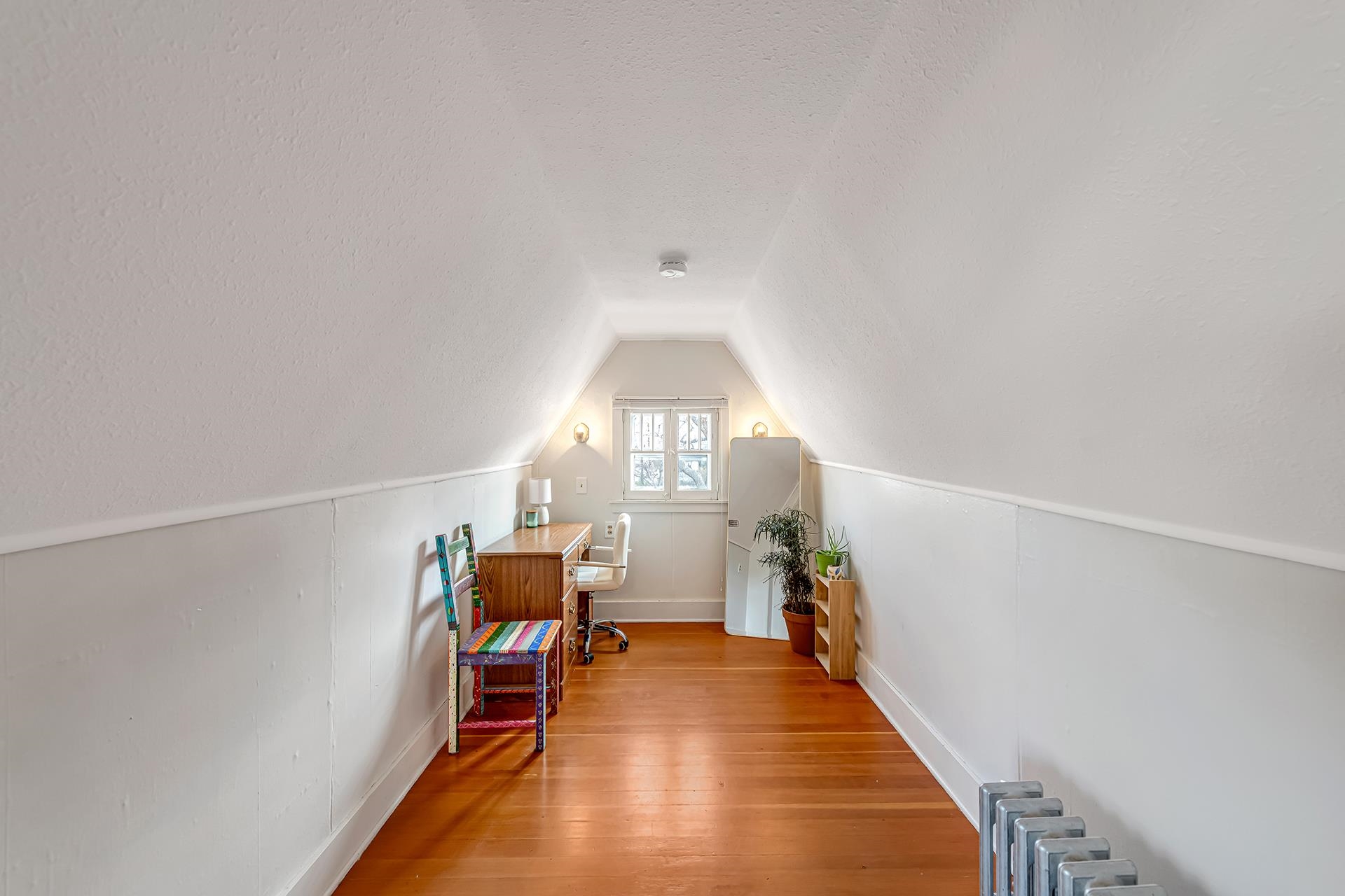 508 Main Street Palisade, CO 81526 - Photo 33 of 40 a living room with furniture and a chandelier