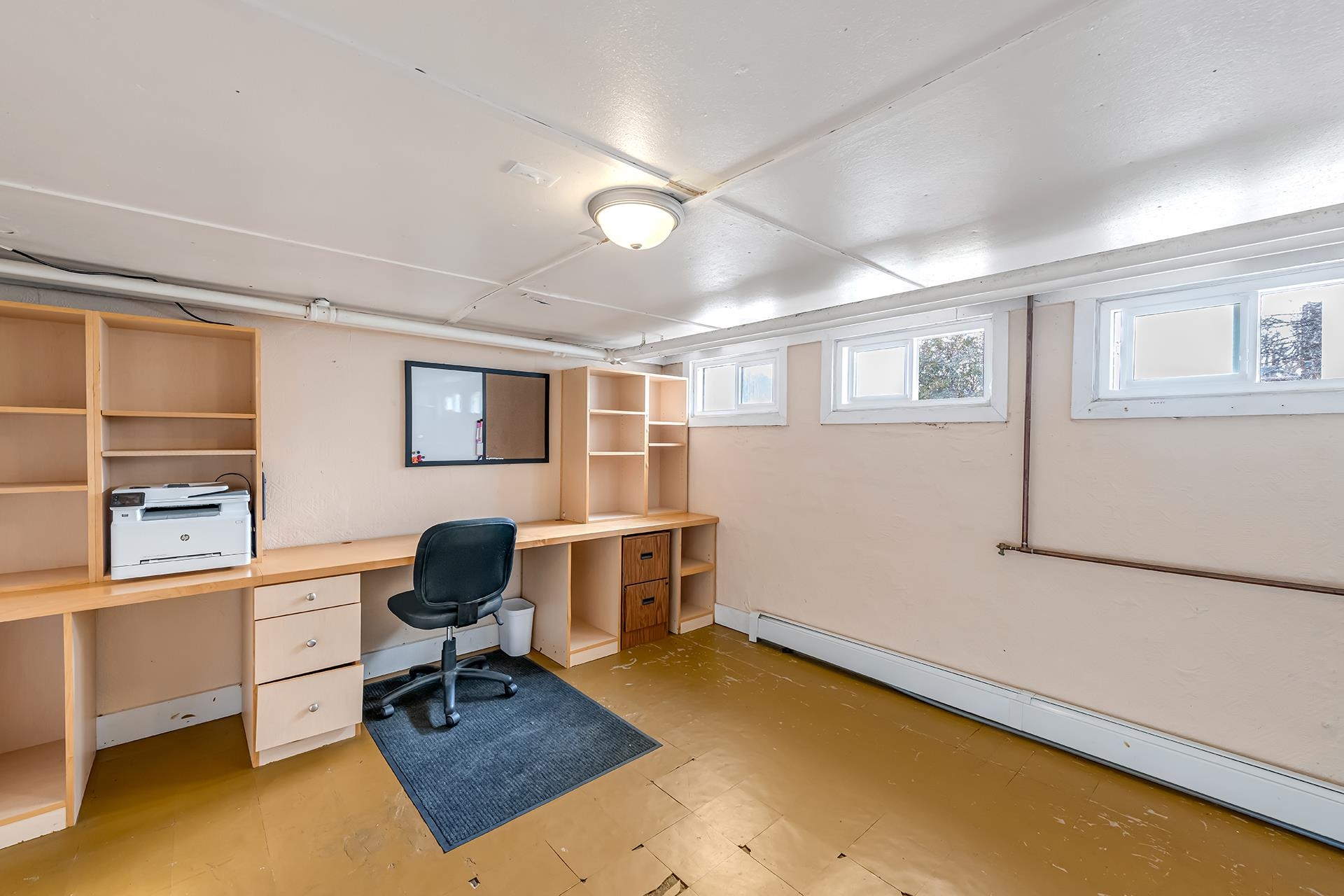 508 Main Street Palisade, CO 81526 - Photo 40 of 40 a view of a workspace with furniture and a window