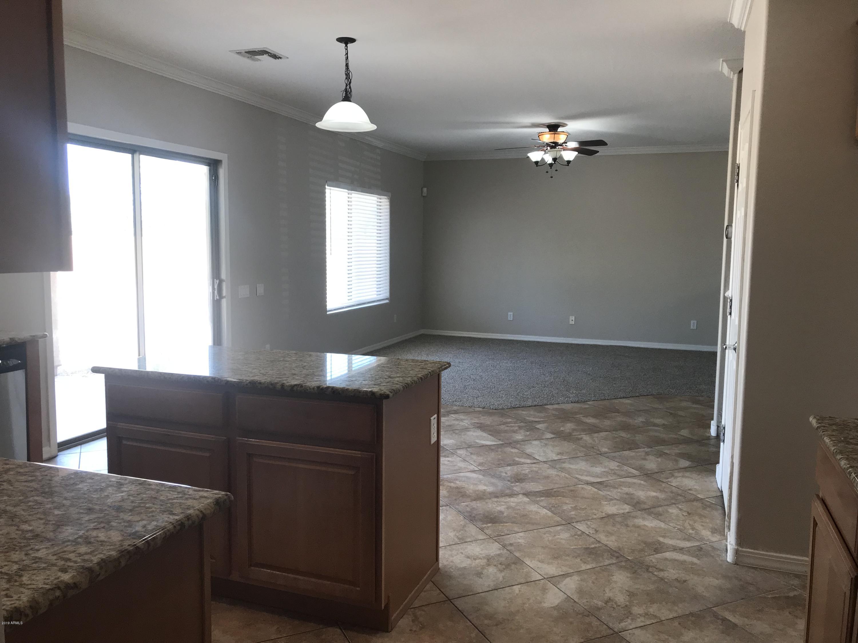 1248 South 167th Drive Goodyear, AZ 85338 - Photo 11 of 50 Kitchen View of Family Room