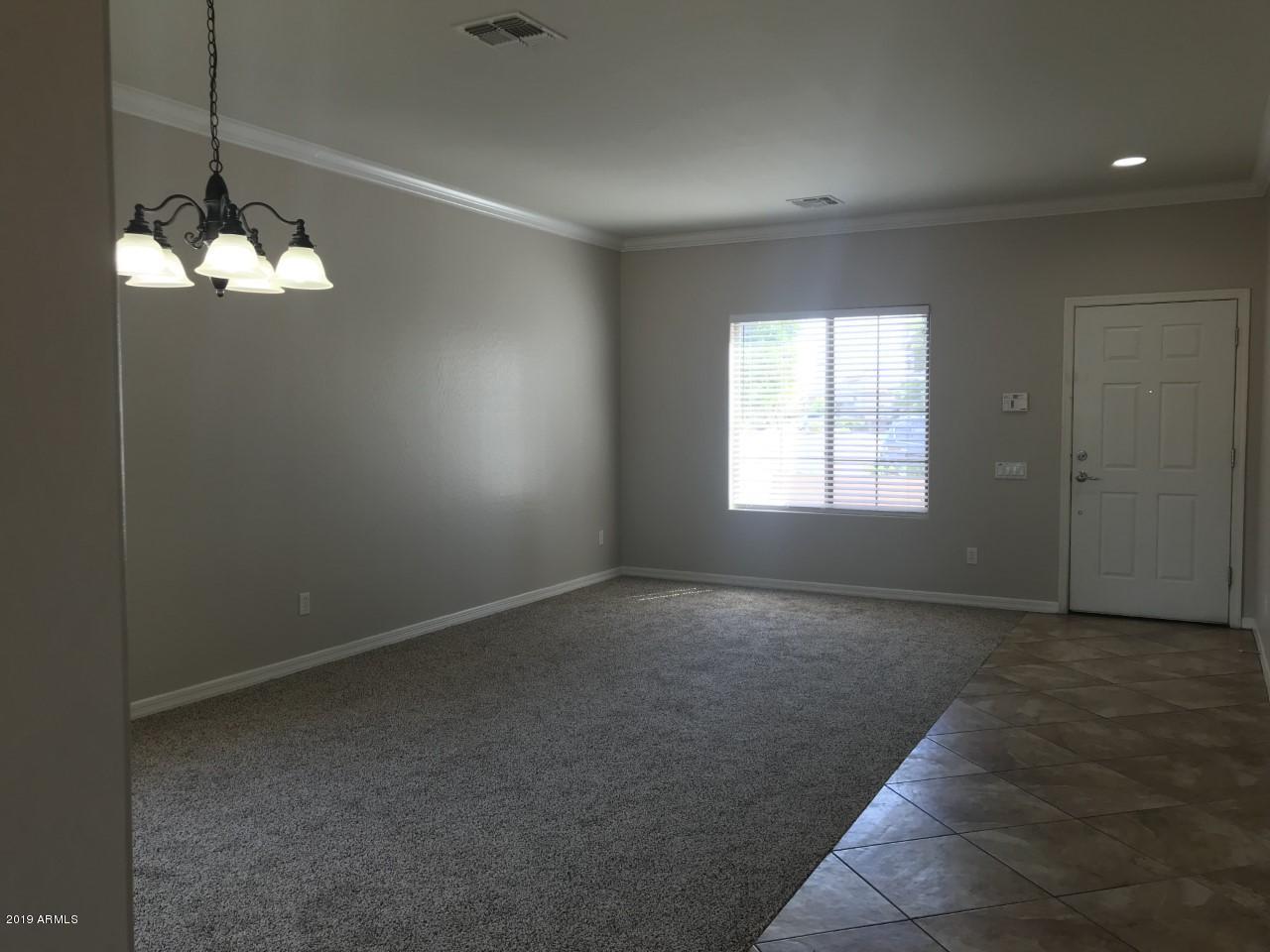 1248 South 167th Drive Goodyear, AZ 85338 - Photo 8 of 50 Main Entrance-Great Room with Formal Din