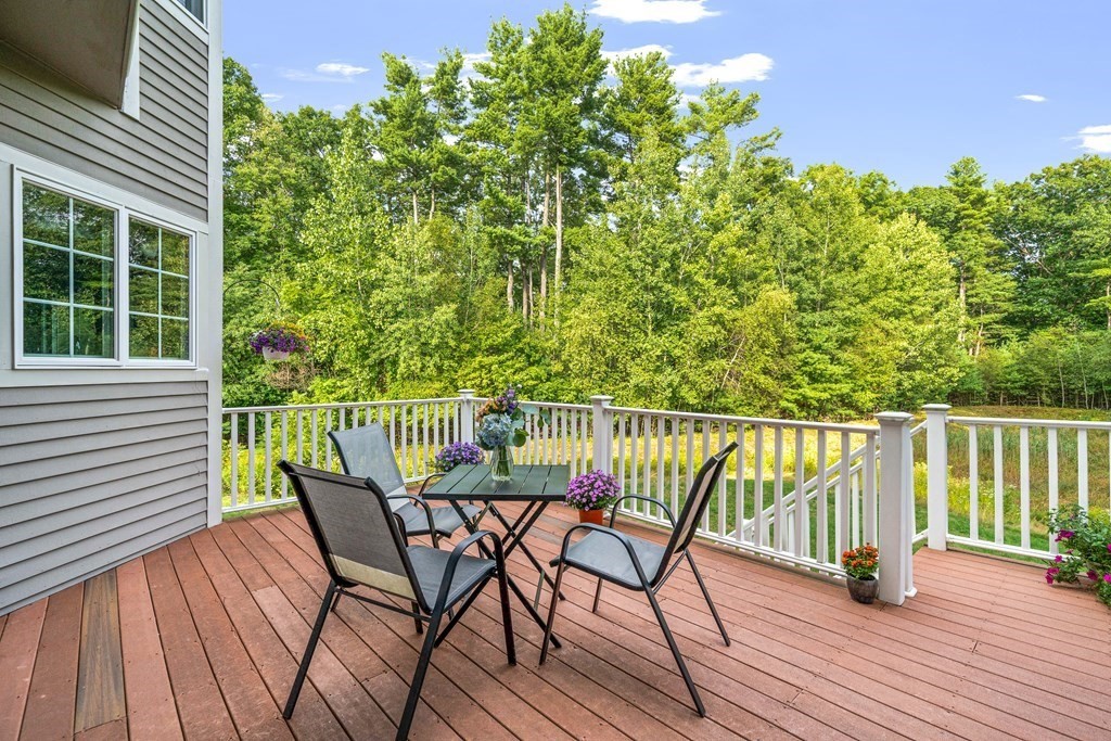 11 Pondview Lane Reading, MA 01867 - Photo 41 of 42 a view of a chairs on the roof deck