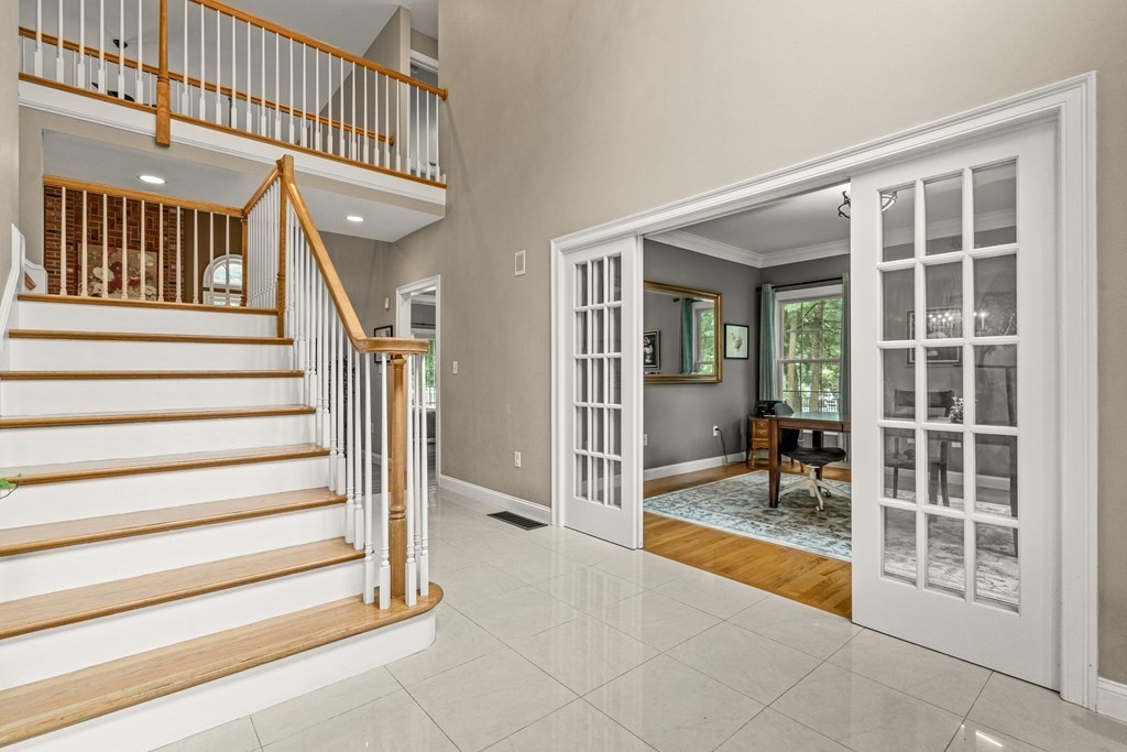 11 Pondview Lane Reading, MA 01867 - Photo 5 of 42 a view of entryway and hall with a living room