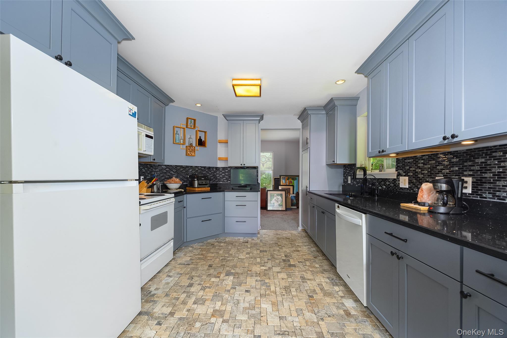 164 Bohl Road Hopewell Junction, NY 12533 - Photo 13 of 30 a kitchen with stainless steel appliances granite countertop a refrigerator and a stove