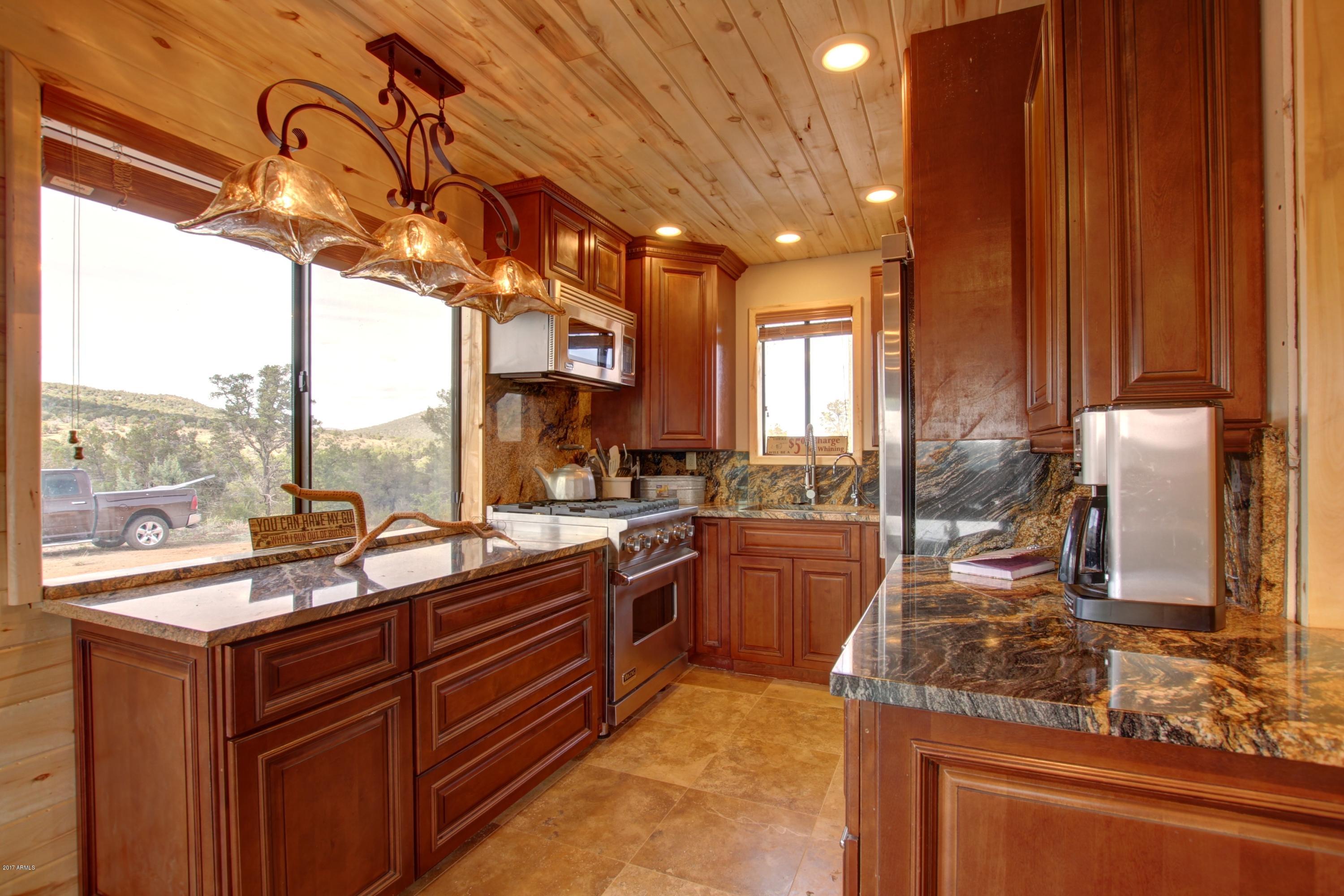 185 West Westridge Young, AZ 85554 - Photo 9 of 51 CUSTOM GALLEY KITCHEN