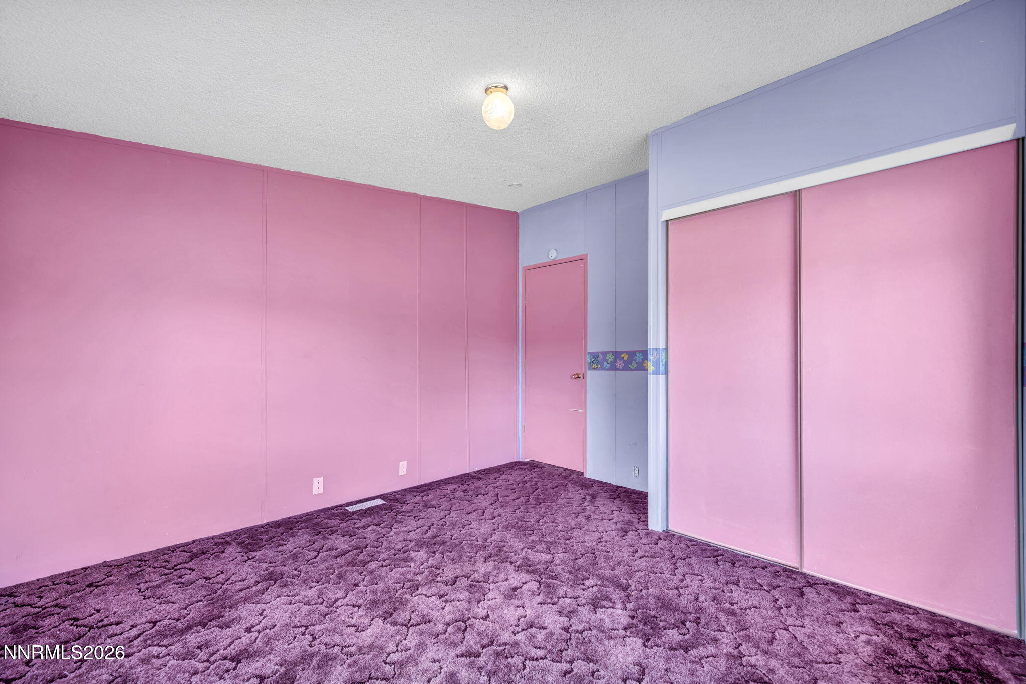 5107 Leon Drive Sun Valley, NV 89433 - Photo 22 of 43 a big room with an empty space